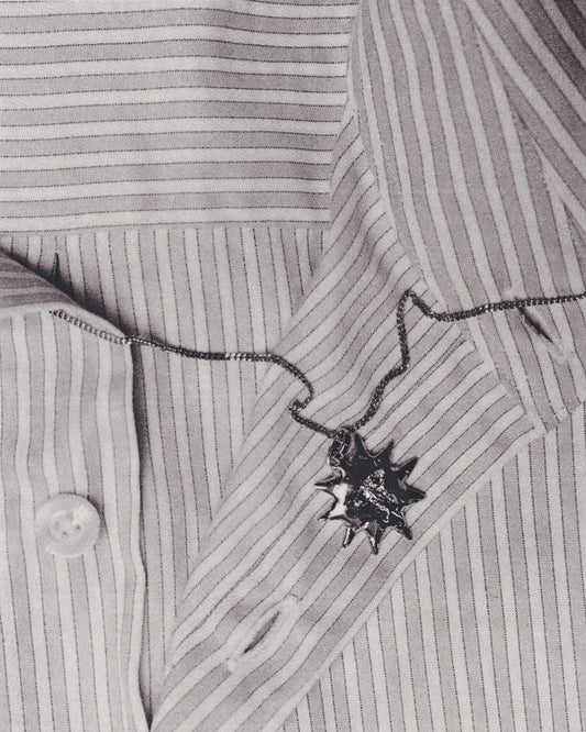 Dije de Sol en Plata