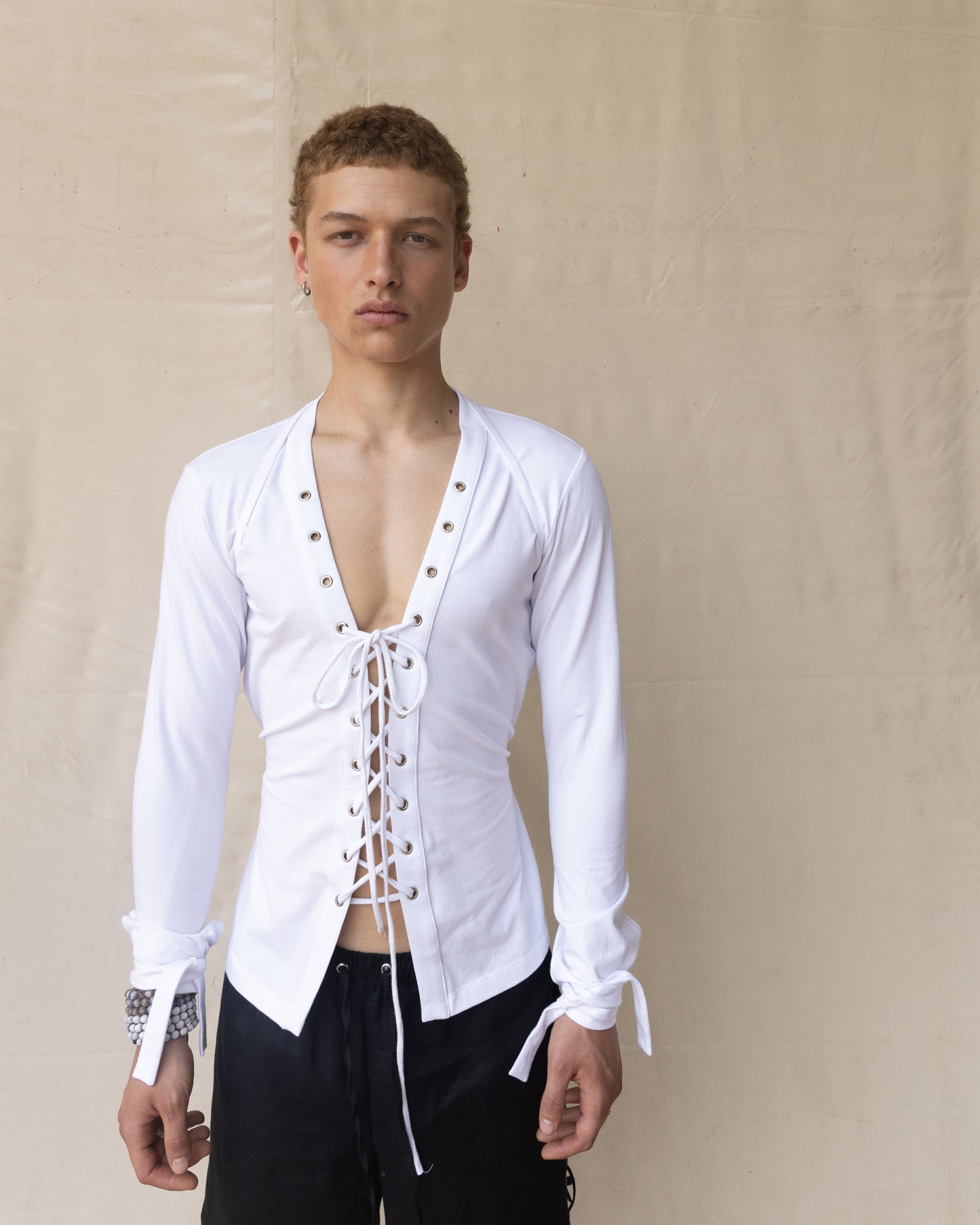 Camisa Jersey con ojillos