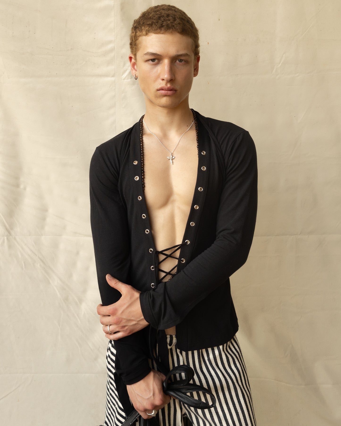 Camisa Jersey con ojillos